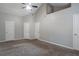 Large bedroom with neutral walls, carpet, and ample closet space at 4480 Joseph Dr, Snellville, GA 30039