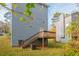 Gray house exterior with wooden deck and stairs at 4480 Joseph Dr, Snellville, GA 30039
