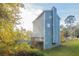 Gray house exterior with wooden deck and stairs at 4480 Joseph Dr, Snellville, GA 30039