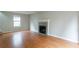Spacious living room with hardwood floors and a fireplace at 4480 Joseph Dr, Snellville, GA 30039