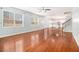 Open concept Gathering room with hardwood floors and views into the kitchen at 2166 Leatherstone Dr, Powder Springs, GA 30127