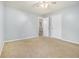 Bedroom with double doors and access to hallway at 2166 Leatherstone Dr, Powder Springs, GA 30127