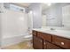 Clean bathroom with a tub, toilet and vanity at 2166 Leatherstone Dr, Powder Springs, GA 30127