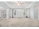 Spacious bedroom with large windows and walk-in closet at 2166 Leatherstone Dr, Powder Springs, GA 30127