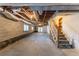 Unfinished basement with exposed beams and ample space at 3619 Colonial Trl, Douglasville, GA 30135