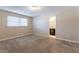 Main bedroom with carpet flooring and ensuite bathroom at 3619 Colonial Trl, Douglasville, GA 30135