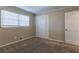 Spacious bedroom with neutral walls and carpet flooring, offering a peaceful atmosphere at 3619 Colonial Trl, Douglasville, GA 30135