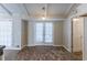 Sunlit dining area with brick floors and access to the outdoors at 3619 Colonial Trl, Douglasville, GA 30135