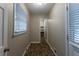 Laundry room with brick flooring and built-in shelving at 3619 Colonial Trl, Douglasville, GA 30135