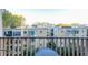 Balcony view overlooking the treetops and neighboring buildings at 145 15Th Ne St # 401, Atlanta, GA 30309