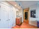 Bright hallway with hardwood floors and built-in storage at 145 15Th Ne St # 401, Atlanta, GA 30309