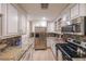 Updated kitchen with stainless steel appliances and granite counters at 145 15Th Ne St # 401, Atlanta, GA 30309