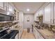 Updated kitchen with stainless steel appliances and granite counters at 145 15Th Ne St # 401, Atlanta, GA 30309