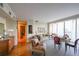 Bright living room with hardwood floors and city views at 145 15Th Ne St # 401, Atlanta, GA 30309