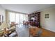 Spacious living room with hardwood floors and built-in shelving at 145 15Th Ne St # 401, Atlanta, GA 30309