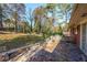 Large backyard with patio and mature trees at 2715 Connally Sw Dr, Atlanta, GA 30311