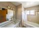 Clean bathroom with a shower/tub combo and vanity at 2715 Connally Sw Dr, Atlanta, GA 30311