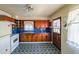 Kitchen with blue countertops and wood cabinets at 2715 Connally Sw Dr, Atlanta, GA 30311