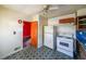 Kitchen with blue countertops and wood cabinets at 2715 Connally Sw Dr, Atlanta, GA 30311