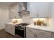 Modern kitchen with stainless steel appliances and white quartz countertops at 350 Olmstead Way # 29, Alpharetta, GA 30022