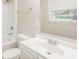 Clean bathroom with white vanity, shower/tub combo, and neutral walls at 2273 Hampton Locust Grove Rd, Locust Grove, GA 30248