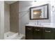 Bathroom with shower, vanity, and large mirror at 2229 Whites Mill Rd, Decatur, GA 30032