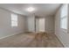 Well-lit bedroom with carpet and an attached bathroom at 2229 Whites Mill Rd, Decatur, GA 30032