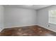 Simple bedroom with hardwood floors and neutral walls at 2229 Whites Mill Rd, Decatur, GA 30032