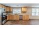 Modern kitchen featuring granite countertops and wood cabinets at 2229 Whites Mill Rd, Decatur, GA 30032