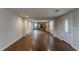 Open floor plan with hardwood floors, connecting to kitchen at 2229 Whites Mill Rd, Decatur, GA 30032