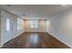 Spacious living room with hardwood floors and neutral walls at 2229 Whites Mill Rd, Decatur, GA 30032
