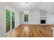 Open concept dining area with hardwood floors and sliding glass doors at 510 Gold Nugget Dr, Woodstock, GA 30189