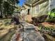 Inviting front entrance with stone pathway and landscaping at 2514 Green Forest Ct, Snellville, GA 30078