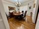 Elegant dining room featuring hardwood floors and a chandelier at 2514 Green Forest Ct, Snellville, GA 30078