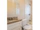 Updated bathroom with granite countertop and tiled shower at 1496 E Highpoint Dr, Douglasville, GA 30134