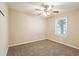 Bright bedroom featuring a ceiling fan and large window at 1496 E Highpoint Dr, Douglasville, GA 30134