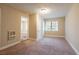 Large bedroom with window, closet and access to other rooms at 1496 E Highpoint Dr, Douglasville, GA 30134
