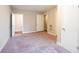 Spacious bedroom with multiple entrances to other rooms at 1496 E Highpoint Dr, Douglasville, GA 30134