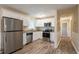 Modern kitchen with stainless steel appliances and granite countertops at 1496 E Highpoint Dr, Douglasville, GA 30134
