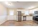 Modern kitchen with stainless steel appliances and granite countertops at 1496 E Highpoint Dr, Douglasville, GA 30134