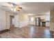 Open concept living and kitchen area with hardwood floors at 1496 E Highpoint Dr, Douglasville, GA 30134