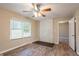 Spacious living room featuring hardwood floors and a brick fireplace at 1496 E Highpoint Dr, Douglasville, GA 30134