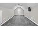 Spacious bonus room with gray carpet and a ceiling fan at 20 Madison Ct, Covington, GA 30016