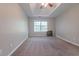 Spacious bedroom with carpet, a ceiling fan, and a window at 2931 Two Lake Cir, Atlanta, GA 30349