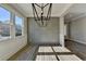 Dining room features gray wall and a modern chandelier at 3757 Wasson Way, Brookhaven, GA 30319