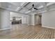 Spacious basement with built-in shelving, a fireplace, and coffered ceiling at 3757 Wasson Way, Brookhaven, GA 30319