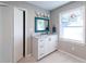 Modern bathroom with a stylish vanity and a large window at 1028 Ridge Ave, Stone Mountain, GA 30083