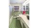 Retro bathroom with green tile floor and shower at 1028 Ridge Ave, Stone Mountain, GA 30083