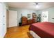 Bright bedroom with hardwood floors and plenty of room for furniture at 1028 Ridge Ave, Stone Mountain, GA 30083