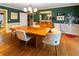 Formal dining room with hardwood floors and an elegant chandelier at 1028 Ridge Ave, Stone Mountain, GA 30083